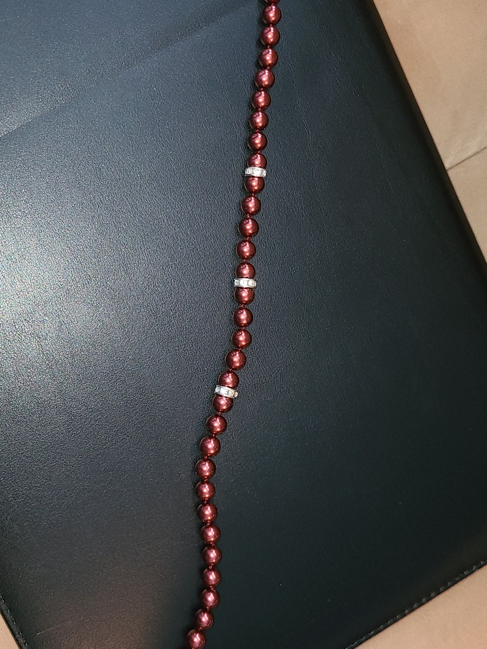 Elegant Dark Red Pearl Beaded Necklace with Silver Accents Approximately 15"